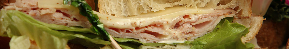 Eating Sandwich at Chissy's Pub & Grill restaurant in Waldo, WI.